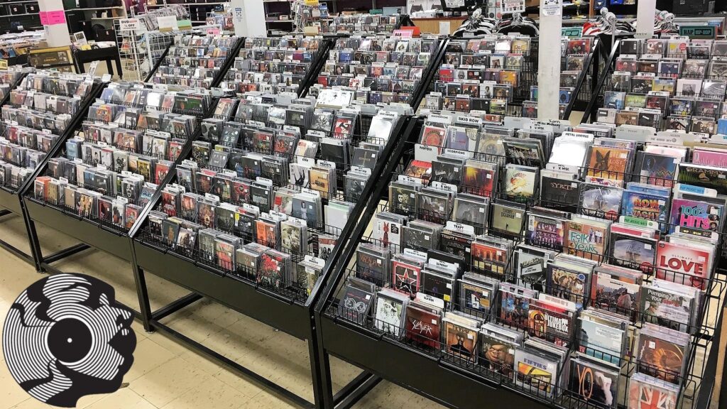A display of CDS in alphabetical order in a music shop