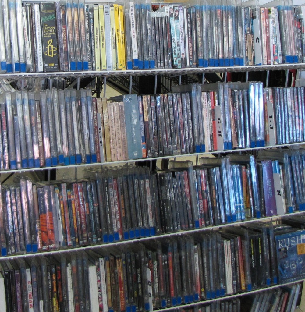 Multiple shelves filled with movie dvds