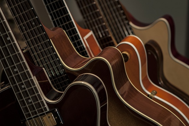 A line up of bass guitars