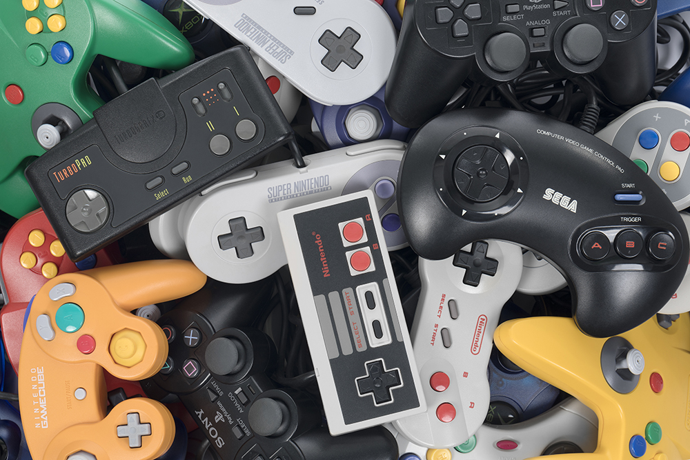 Pile of video game controlers