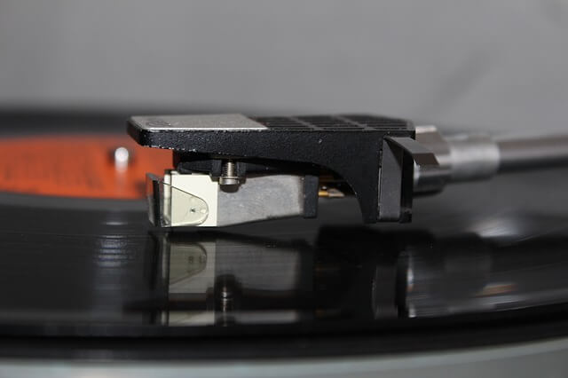 close up of a record playing on a record player