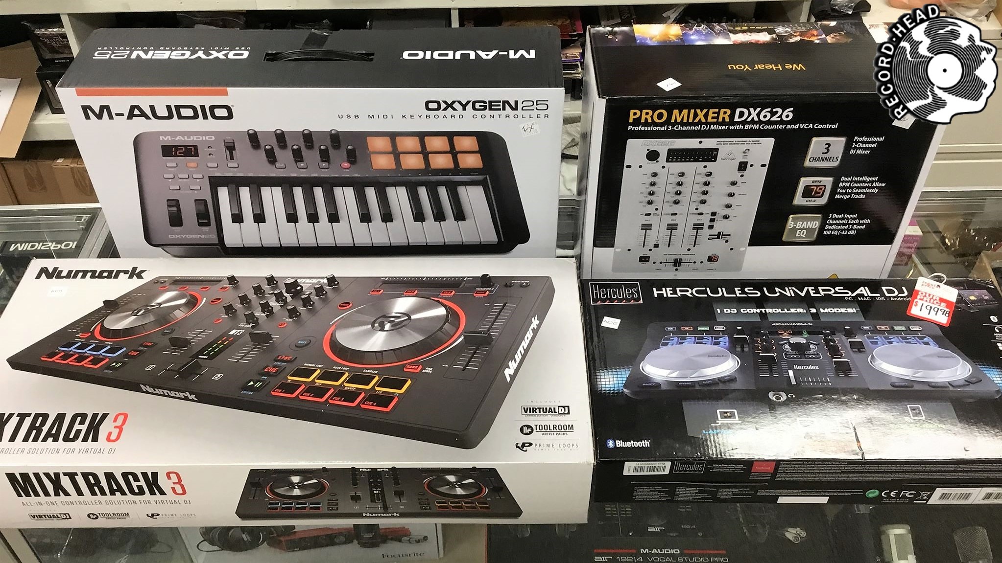 Oxygen 25 USB mini keyboard controller and Pro Mixer DX6 Professional 3-channel DJ Mixer. Studio equipment for sale, still in boxes.
