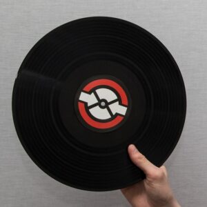 Man Holding up Record