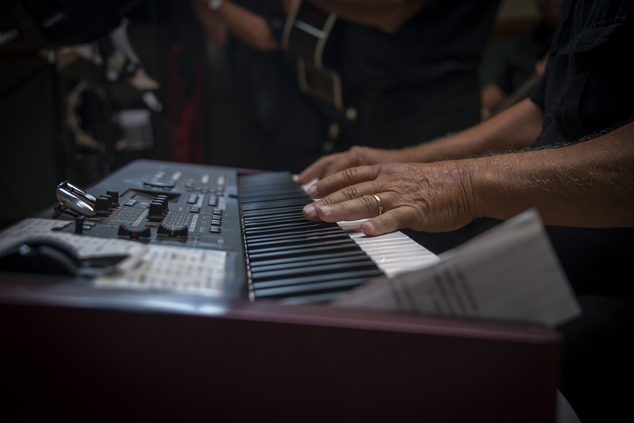 man playing a keyboard